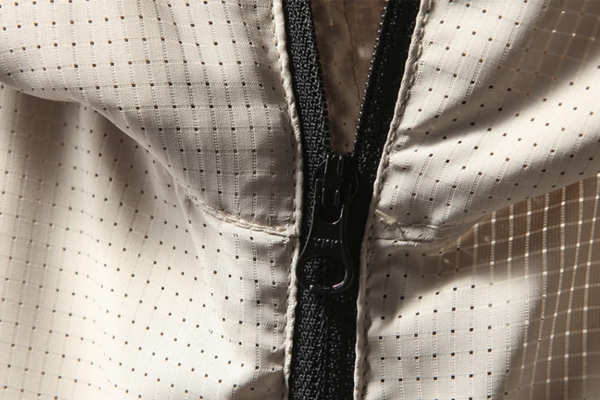 服裝布料透氣孔開孔設備——布料激光打孔機 服裝布料透氣孔開孔設備——布料激光打孔機